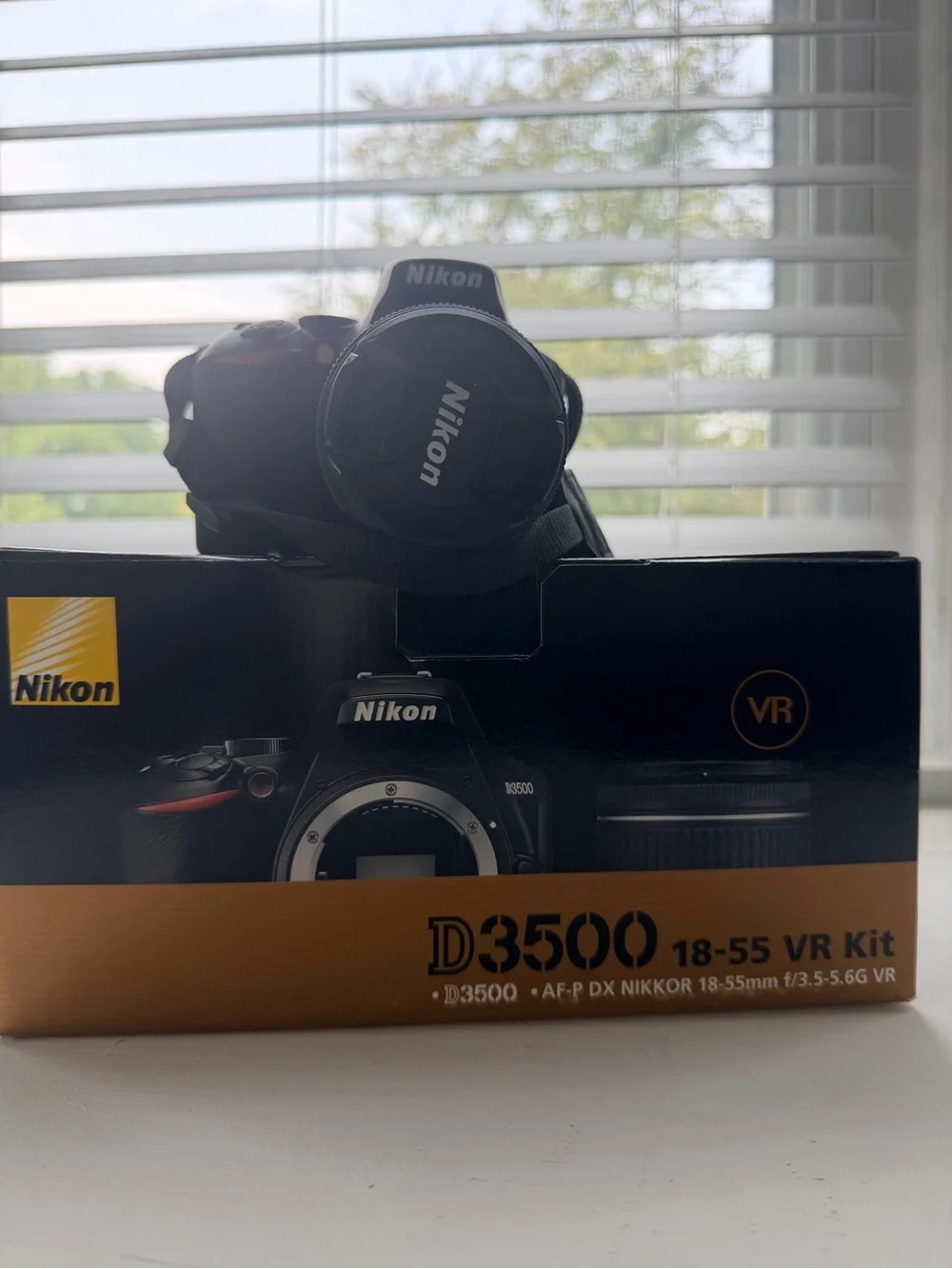 Nikon D3500 DSLR Camera Kit in Black with Orange Accent